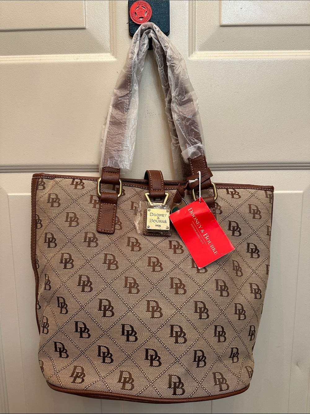 Dooney & Bourke Tan Signature Logo Tote Bag